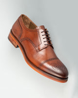Chelia · derby · cognac