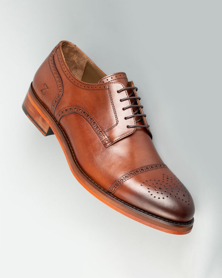 Chelia · derby · cognac