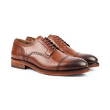 Chelia · derby · cognac