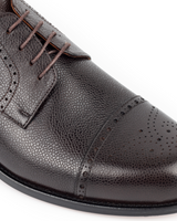Gyala · derby · marron