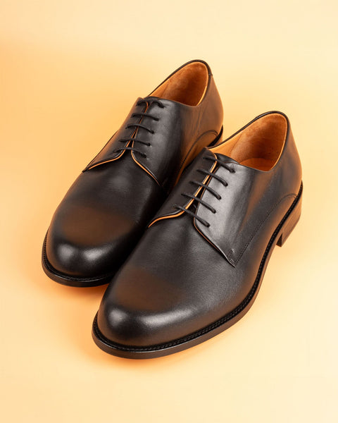 Somoni · blucher · negro