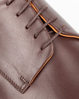 Somoni · derby · brown